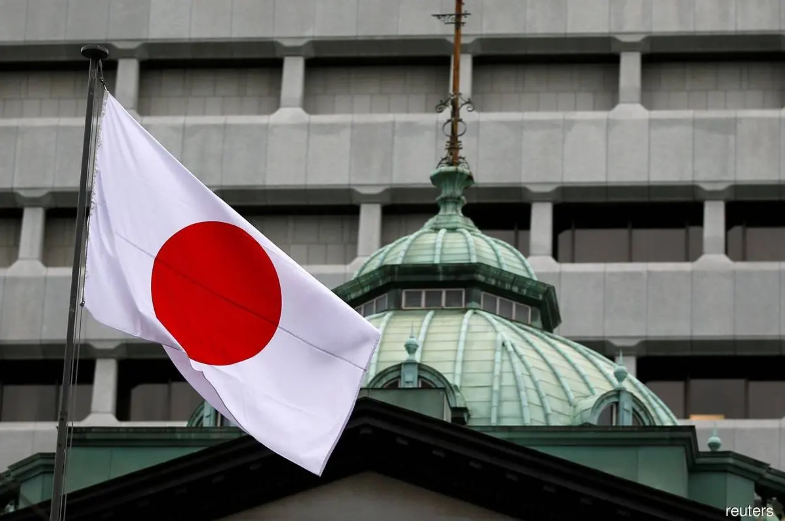 Bank of Japan raises interest rates, outlines bond taper plan